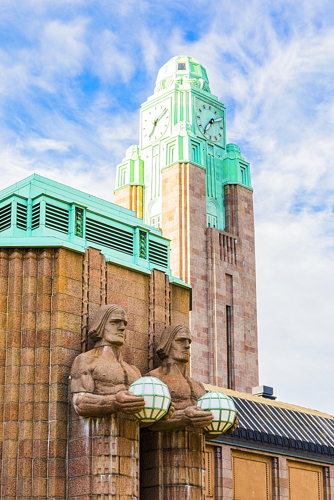 Emil Wikstrom's statues on Helsinki Central Station in Helsinki, Finland, Europe