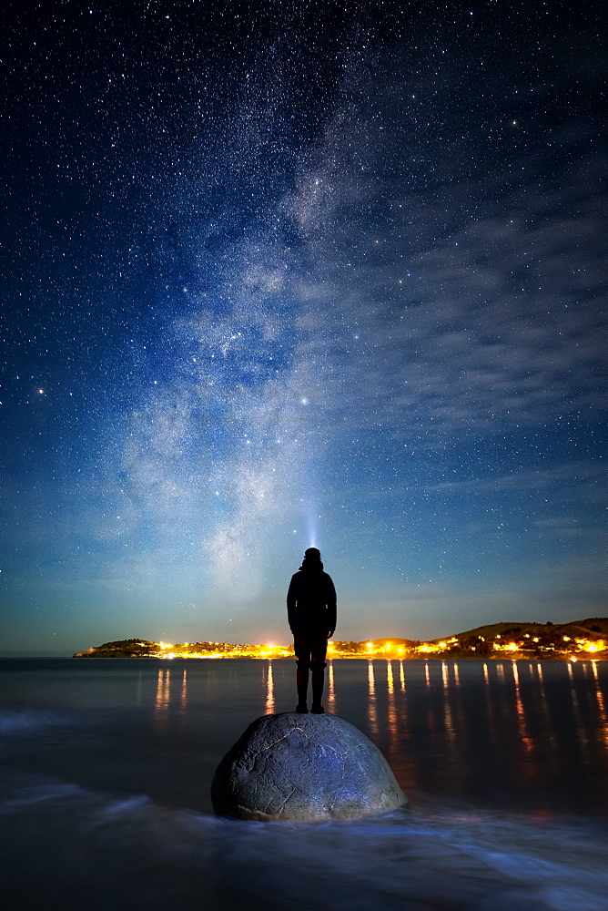 Star gazing at Moeraki Boulders, Milky Way, Koekohe Beach, Moeraki Peninsula, Otago, South Island, New Zealand, Pacific