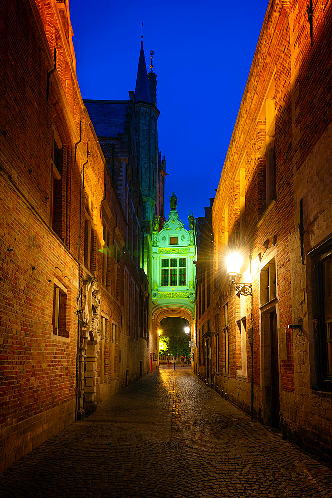 The gold trimmed tunnel and walkway leading to the Palace of the Liberty in Bruges (Brugge), Belgium, Europe