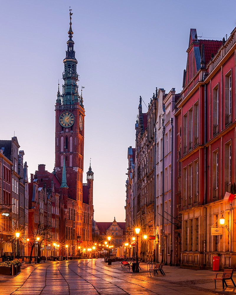 Dlugi Targ Street looking towards the clock tower of the museum at night, Gdansk, Poland, Europe