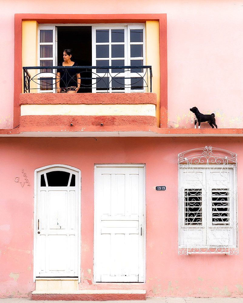 Woman looking for the dog, Cienfuegos, Cuba, West Indies, Caribbean, Central America