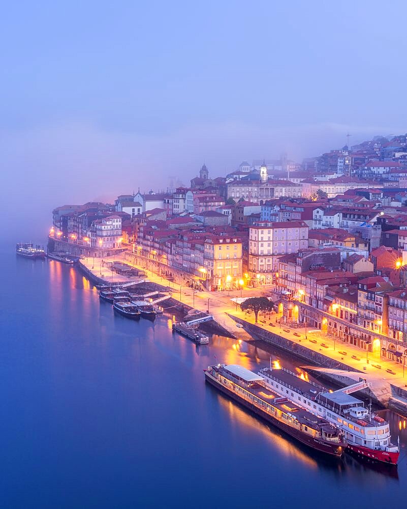 Porto with an early morning sea fog in the background, Porto, Portugal, Europe