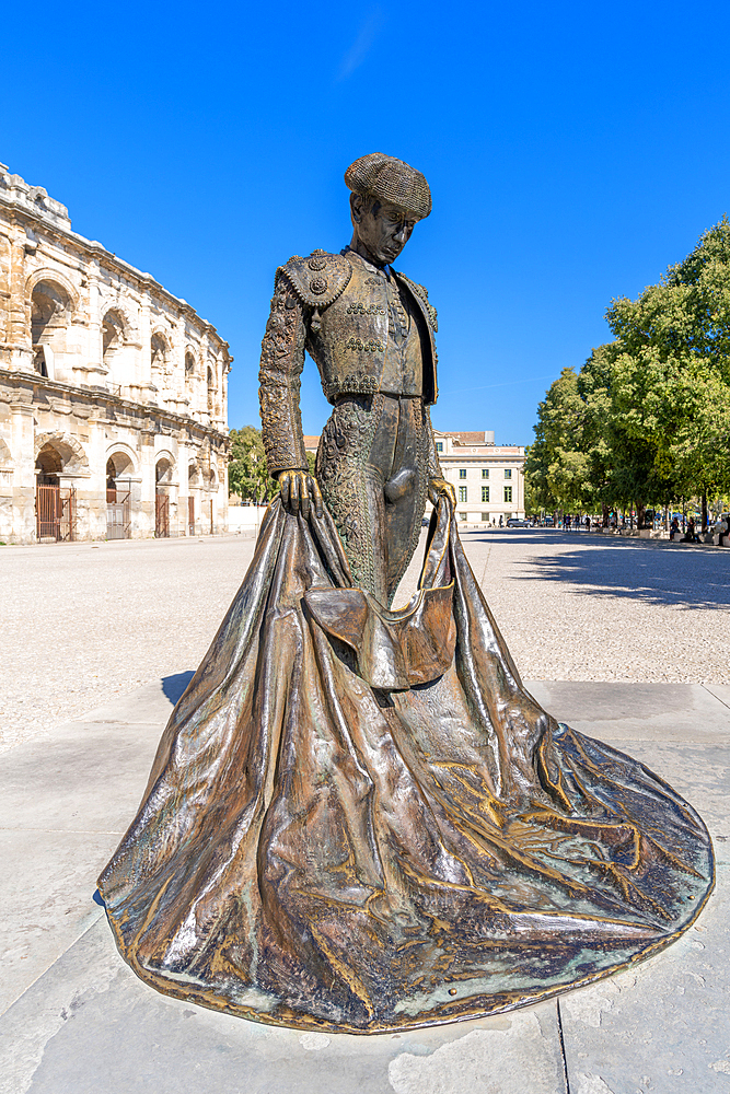 Nimeno Bullfighter Statue, the arena of Nimes, Roman amphitheatre, Nimes, Gard, Occitania, France, Europe