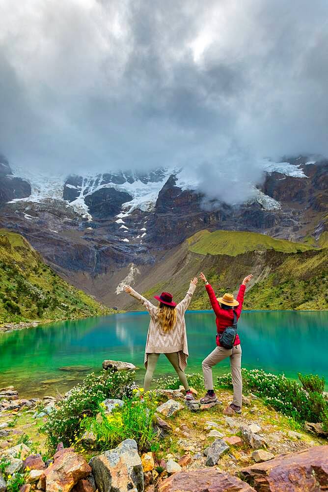 Two woman trekking Humantay Lake, Cusco, Peru, South America