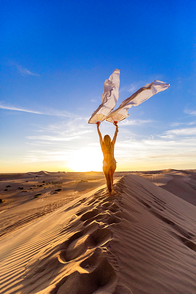 Ethereal woman at the Imperial Sand Dunes, California, United States of America, North America