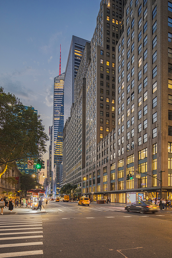 Early evening scene at a busy midtown intersection in New York City, New York City, United States of America, North America