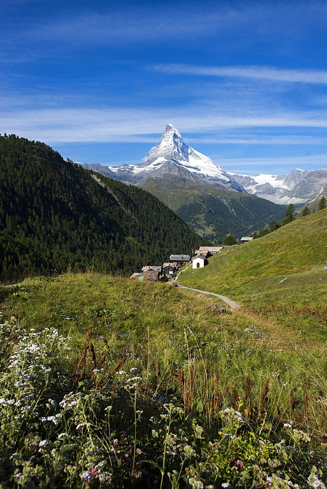 The classic Walkers Haute route from Chamonix to Zermatt the trail leads down into Zermatt with the Matterhorn ahead,  Swiss Alps, Switzerland, Europe