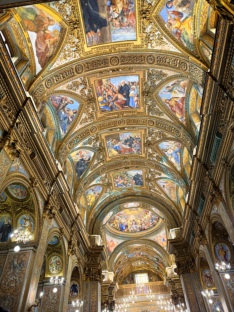 The religious frescos on the ceiling of the 8th century Church of San Giorgio in the city of Salerno. Italy. Europe.