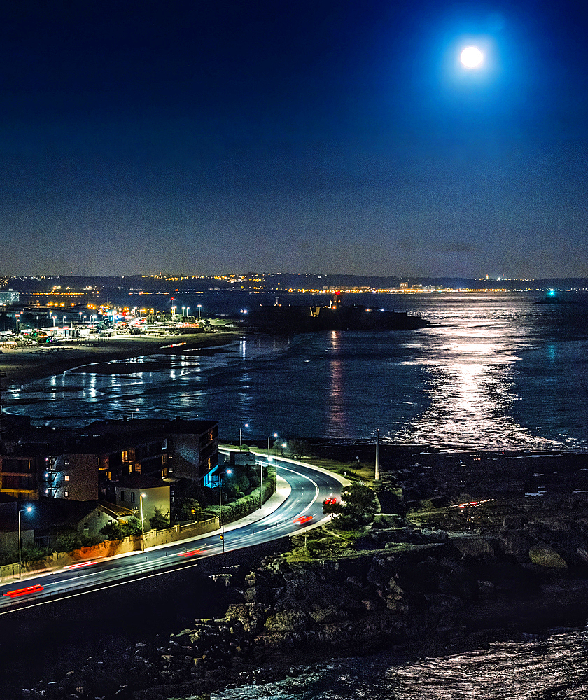 Aerial view of the super full moon over the Tagus River in Lisbon, Portugal, Europe