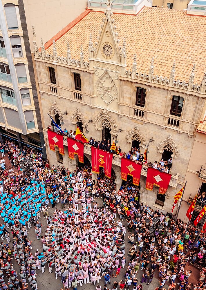 Castell human tower in front of the City Hall during the Festa Major Festival, elevated view, Terrassa, Catalonia, Spain, Europe