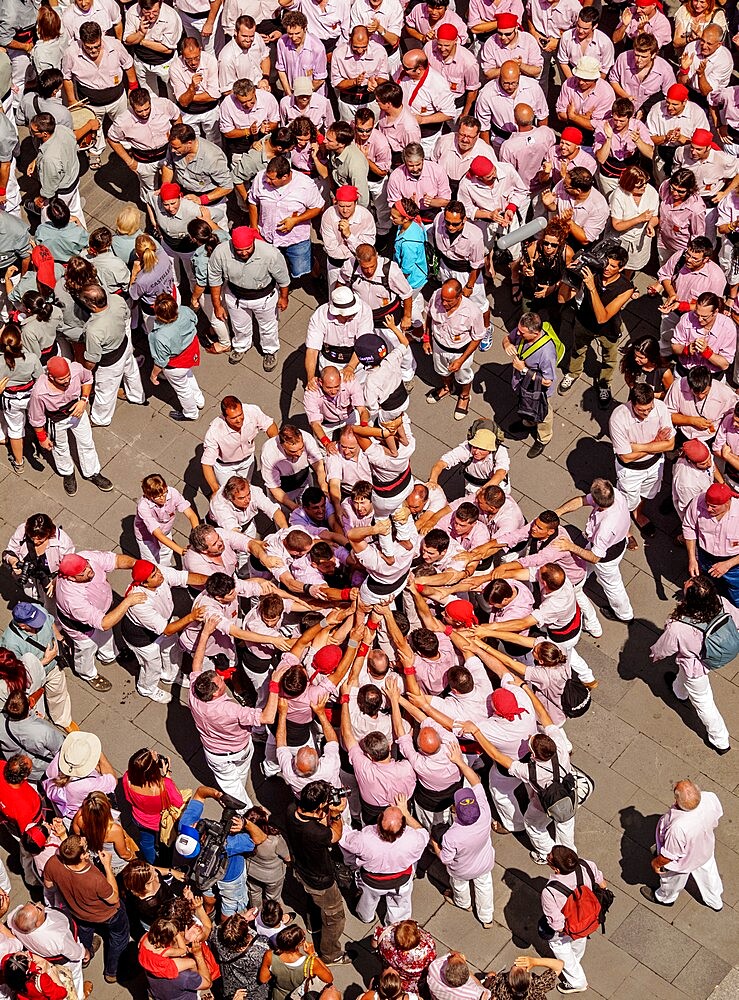 Castell human tower in front of the City Hall during the Festa Major Festival, elevated view, Terrassa, Catalonia, Spain, Europe