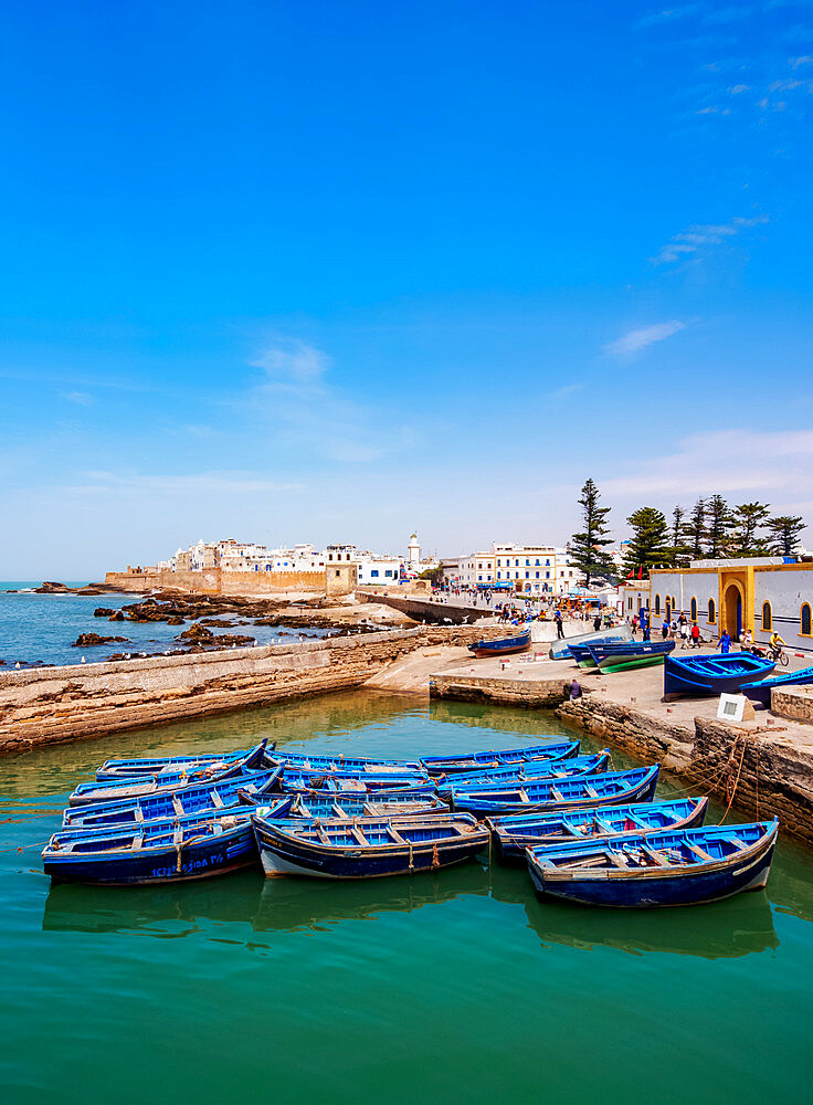 Cityscape with blue boats in the Scala Harbour and the Medina city walls, Essaouira, Marrakesh-Safi Region, Morocco, North Africa, Africa