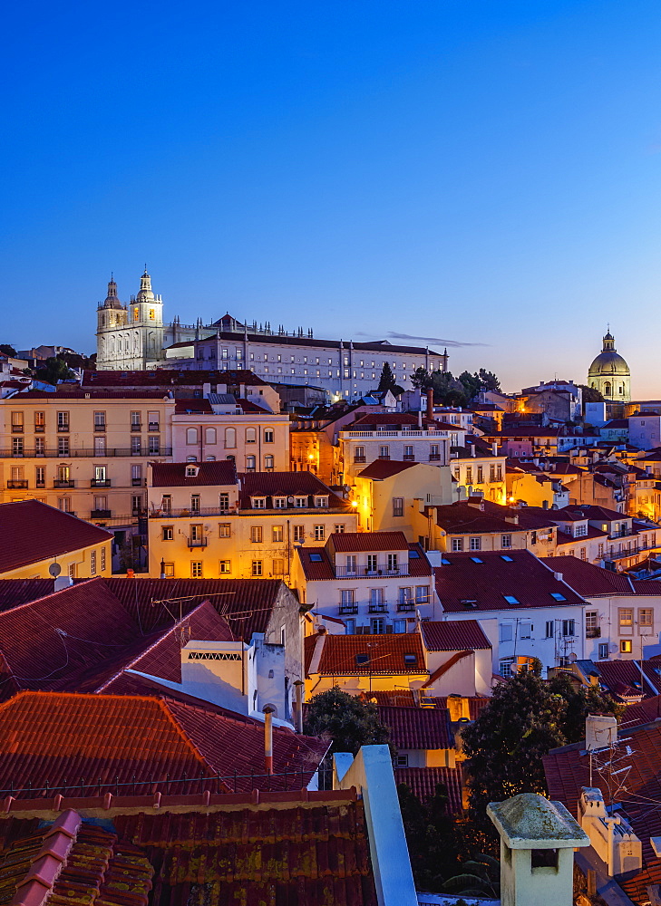 Miradouro das Portas do Sol, twilight view over Alfama Neighbourhood towards the Sao Vicente de Fora Monastery, Lisbon, Portugal, Europe