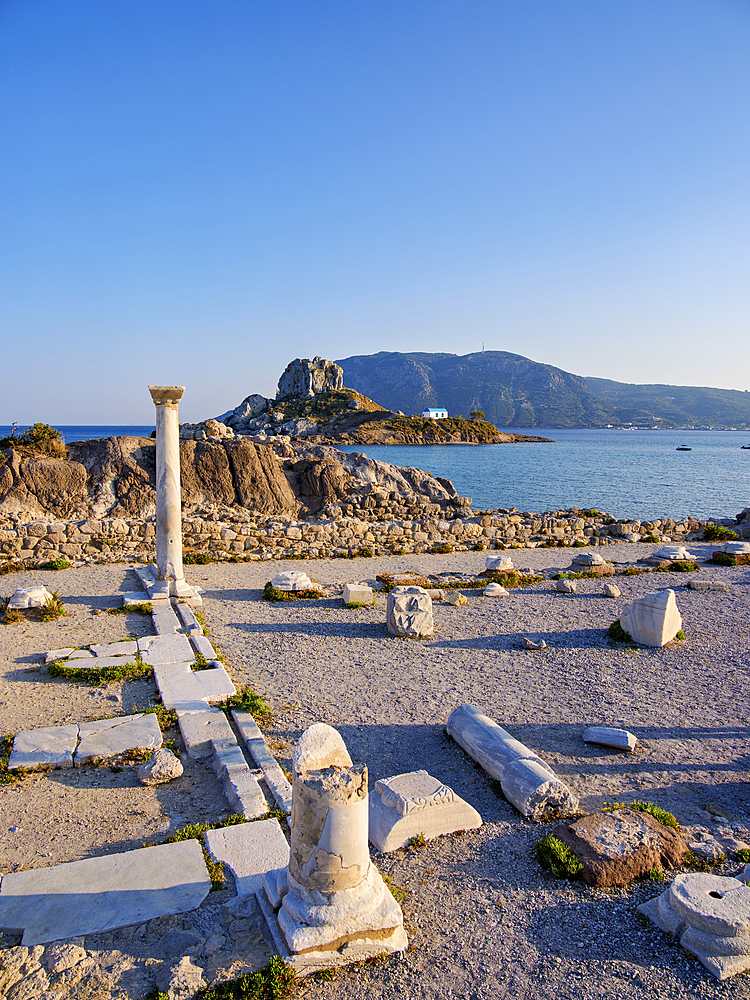 St. Stefanos Basilica Ruins and Kastri Island at sunset, Agios Stefanos Beach, Kos Island, Dodecanese, Greek Islands, Greece, Europe