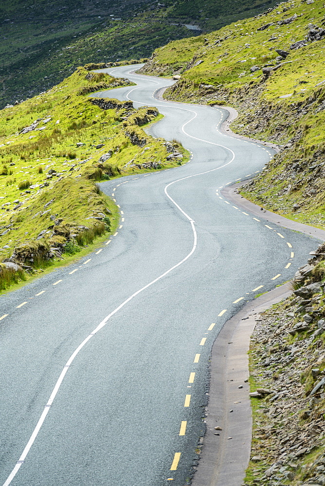 Winding road leading to the pass, Connor Pass, Dingle Peninsula, County Kerry, Munster province, Republic of Ireland, Europe