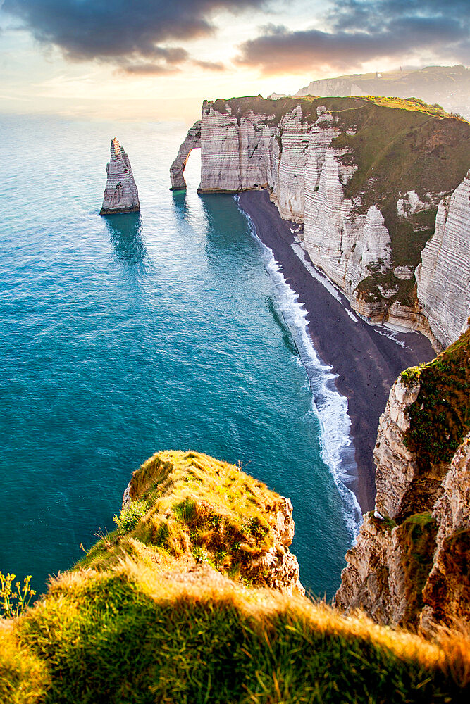 Les Falaises (cliffs) of Etretat at sunrise, Etretat, Normandy, France, Europe