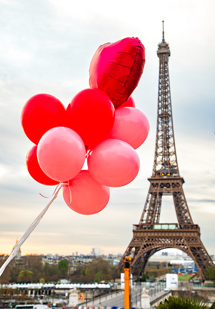 Pink and red balloons in front of Eiffel tower, Paris, France