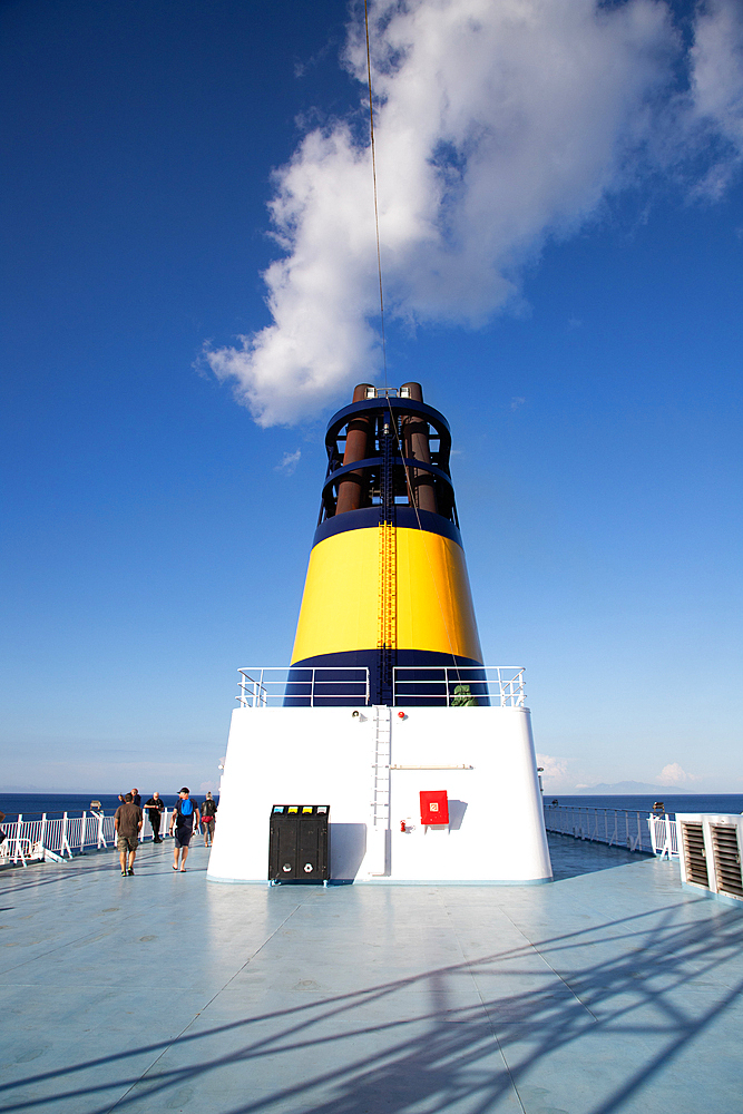 Deck and funnel of a ferry sailing over sea, France