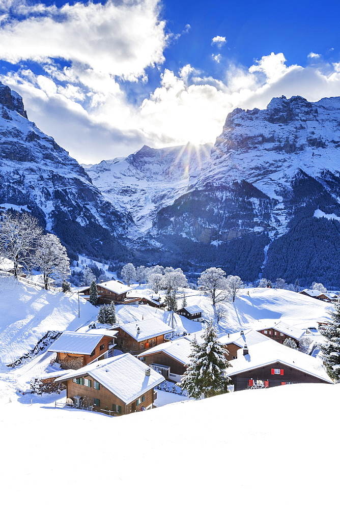 Traditional houses after a snowfall, Grindelwald, Canton of Bern, Switzerland, Europe