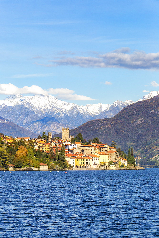 Village of Rezzonico with snowcapped mountains in the background, Lake Como, Lombardy, Italian Lakes, Italy, Europe