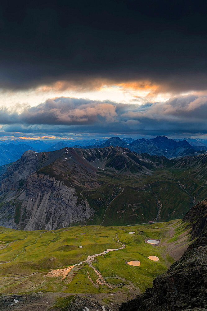 Mountain lakes from above illuminated by sunset, Stelvio Mountain pass, Stelvio National Park, Valtellina, Lombardy, Italy, Europe