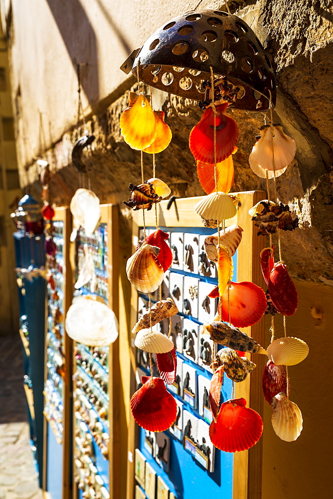 Colourful souvenirs and sea shells for sale in Crete, Greek Islands, Greece, Europe