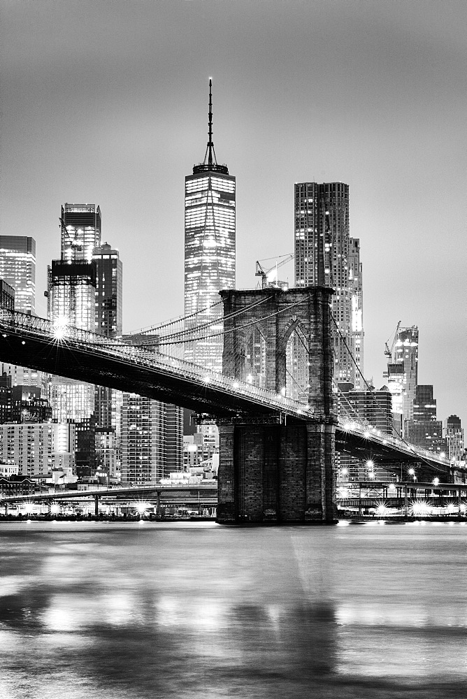 Brooklyn Bridge with 1 World Trade Centre in the background. New York City, New York, United States of America, North America