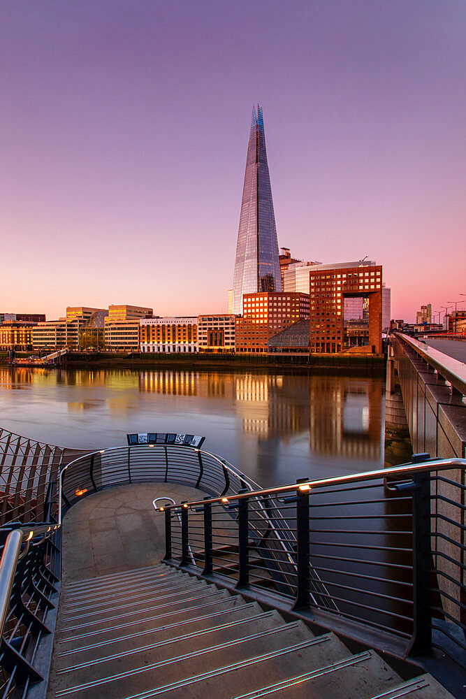 The Shard and London Bridge at sunrise with reflections on the River Thames, London, England, United Kingdom, Europe