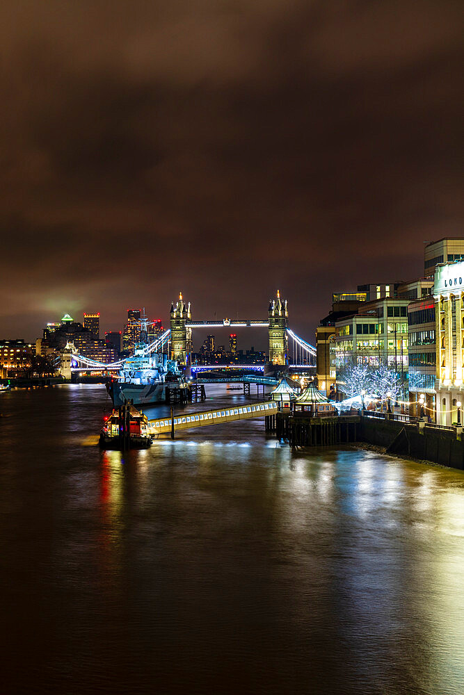 Tower Bridge and HMS Belfast on River Thames at night, London, England, United Kingdom, Europe