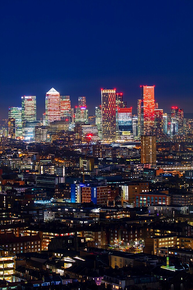 Aerial view of East London and Canary Wharf at sunset, London, England, United Kingdom, Europe