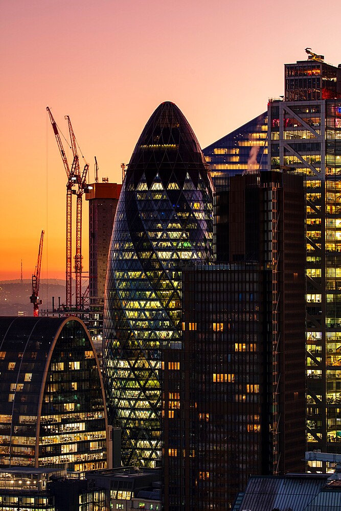 Aerial view of London skyline at sunset, including City of London skyscrapers, London, England, United Kingdom, Europe