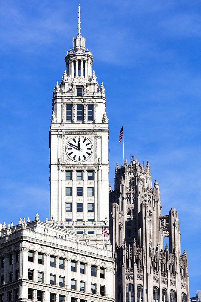 The Wrigley Building clock tower on a sunny day, Chicago, Illinois, United States of America, North America