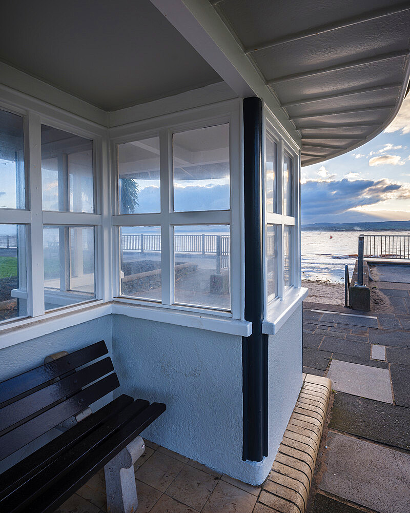 Late afternoon view through a shelter above steps to the beach, Exmouth, Devon, England, United Kingdom, Europe