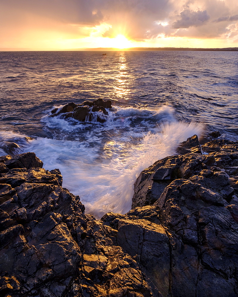 Sunrise across the bay towards Godrevy and Gwithian, St. Ives, Cornwall, England, United Kingdom, Europe