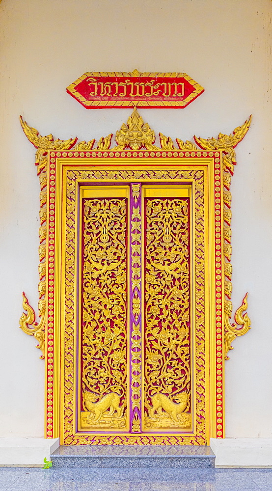 An ornate temple door at the Office of National Buddhism, in Phuket Town, Phuket, Thailand, Southeast Asia, Asia