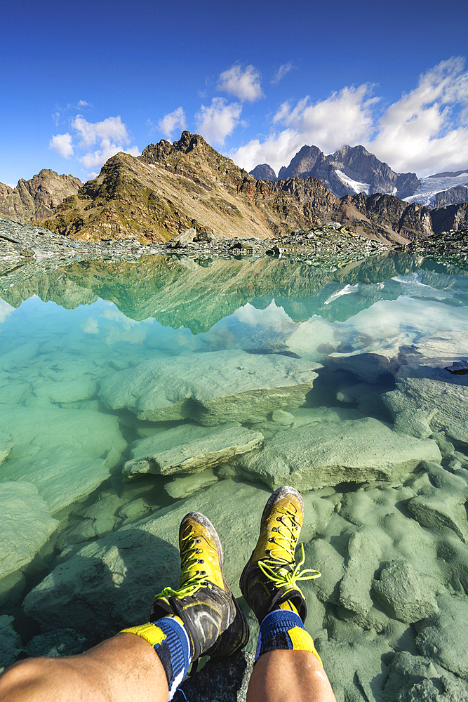 Relaxing in Alpine lake, Valmalenco in Valtellina, Sondrio province, Lombardy district, Italy, Europe