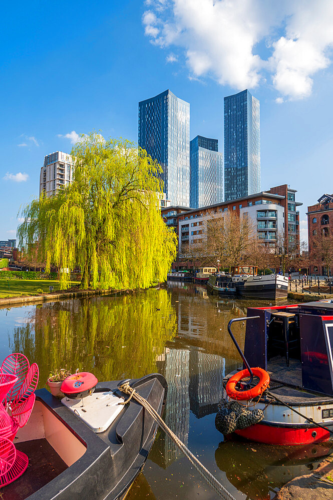 Skyscrapers reflected at Castlefield Basin, Manchester, England, United Kingdom, Europe