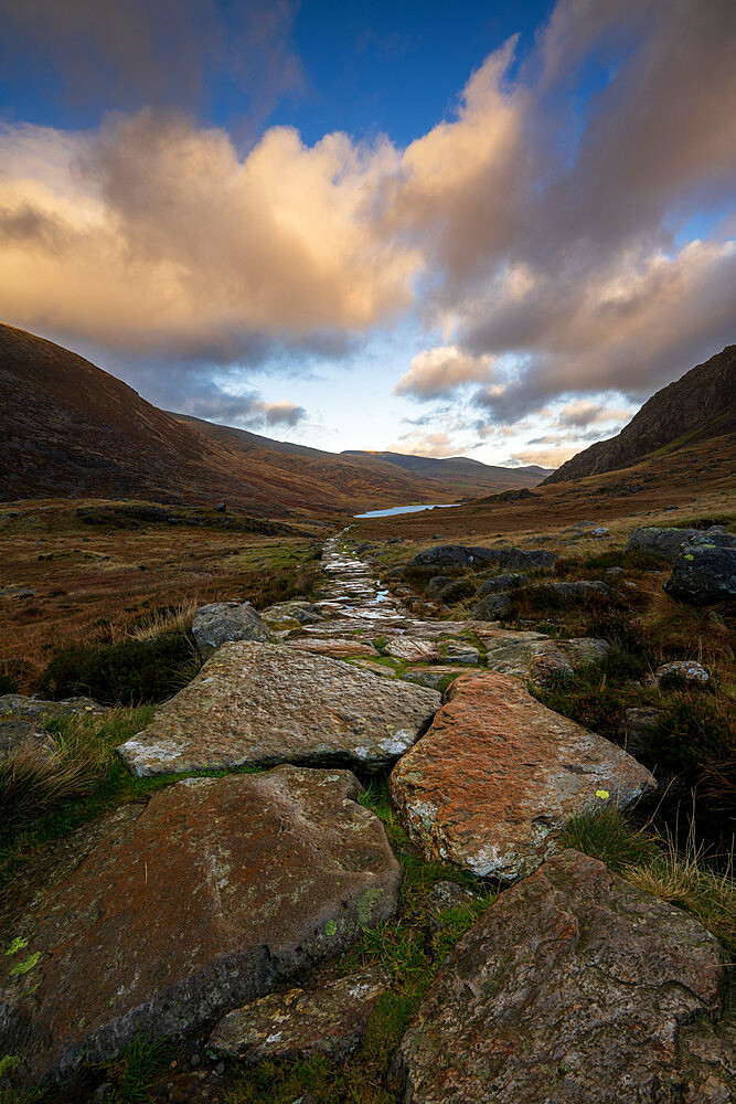 Stone footpath leading towards Llyn Ogwen in Snowdonia National Park. Ogwen, Conwy, Wales