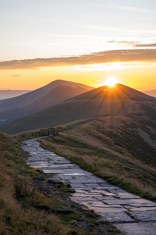 The sun rising directly above Lose Hill and Back Tor, The Peak District National Park, Derbyshire, England, United Kingdom, Europe