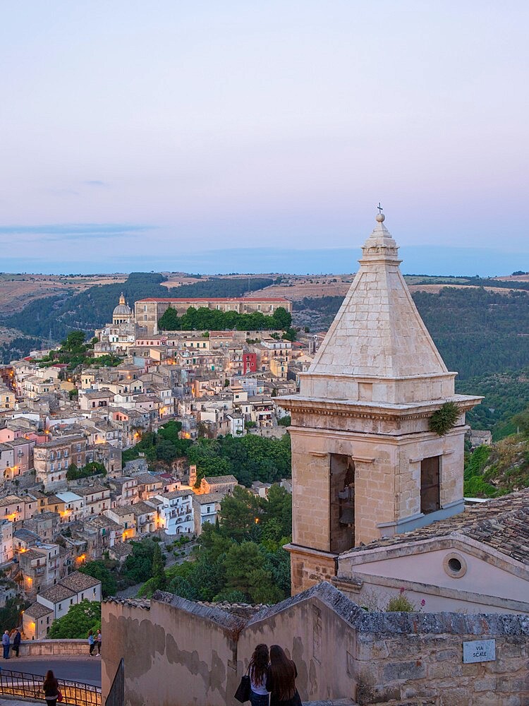 View over Ragusa Ibla, dusk, bell-tower of the Church of Santa Maria delle Scale in foreground, Ragusa, UNESCO World Heritage Site, Sicily, Italy, Europe