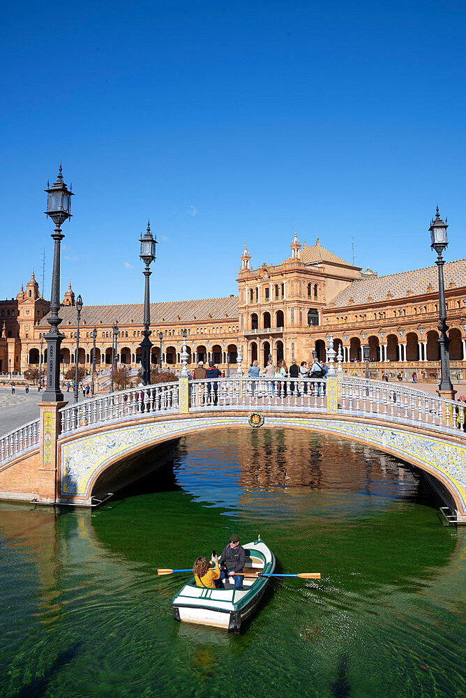 Rowing boat on the canal of Plaza de Espana, Seville, Andalusia, Spain, Europe