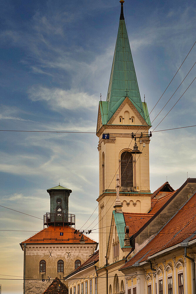 The Historic Lotrscak Tower in the background with a Greek Orthodox Seminary in the foreground, Zagreb, Croatia, Europe