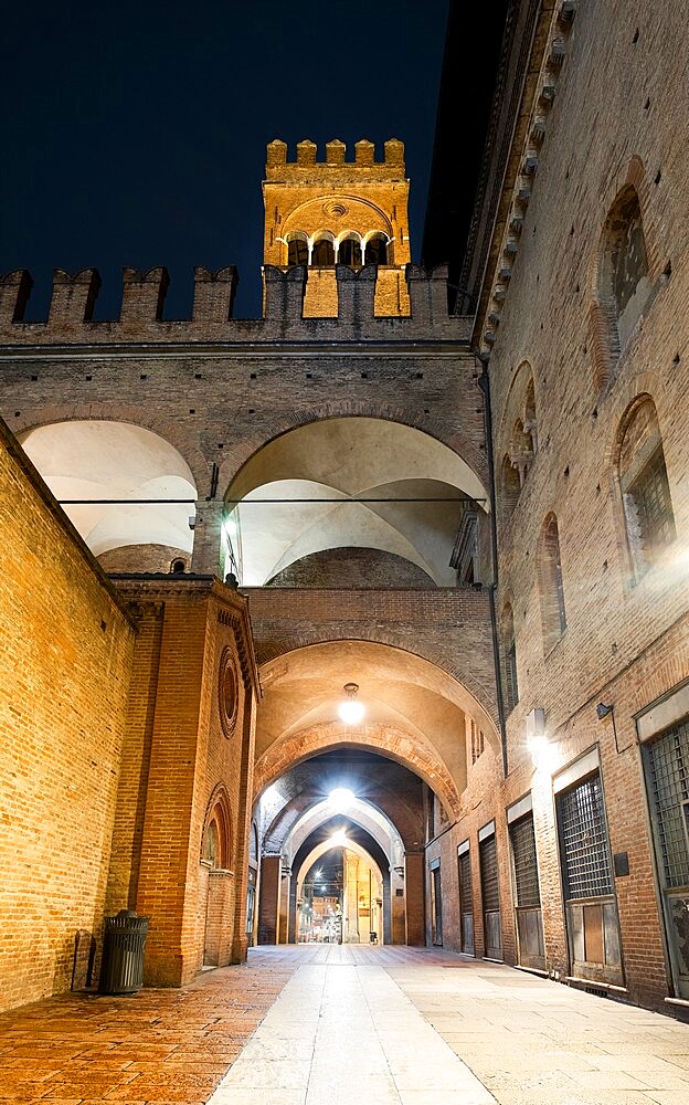 Night view of the Arengo tower in Piazza Maggiore, Bologna, Emilia Romagna, Italy, Europe