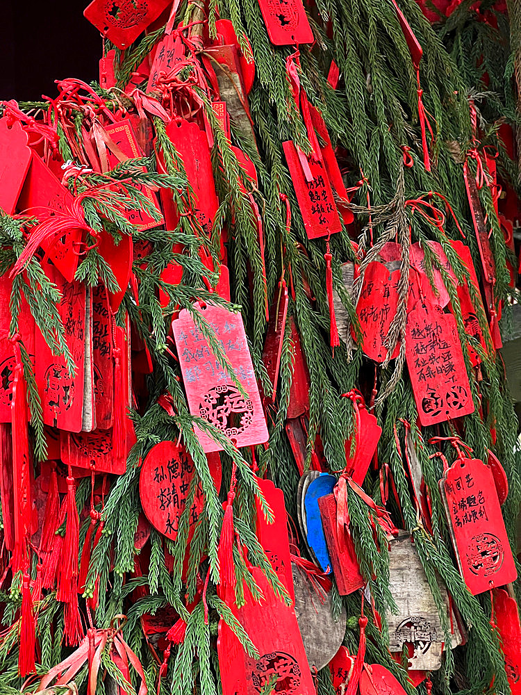 Prayers painted on red wood tablets