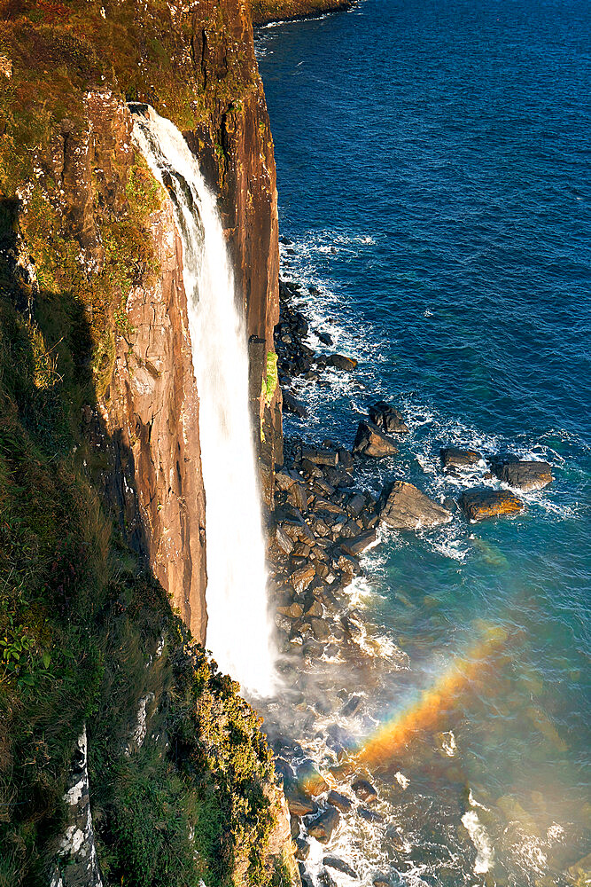 Kilt waterfall falling directly into the sea on the Isle of Skye, Inner Hebrides, Scotland, United Kingdom