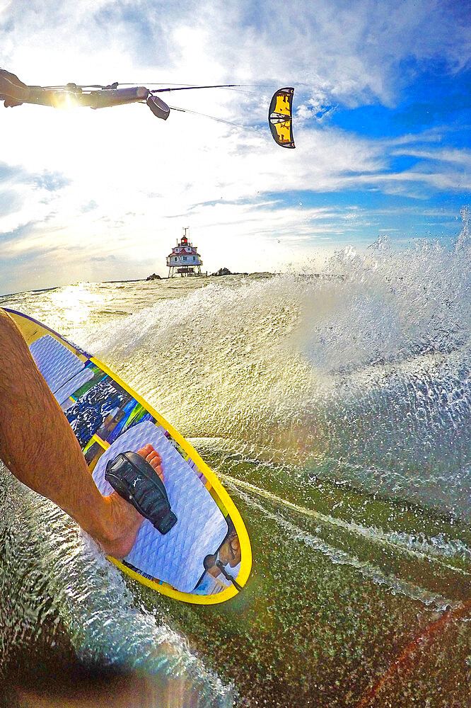 Photographer Skip Brown kiteboards next to Thomas Point Lighthouse on Chesapeake Bay near Annapolis, Maryland, United States of America, North America