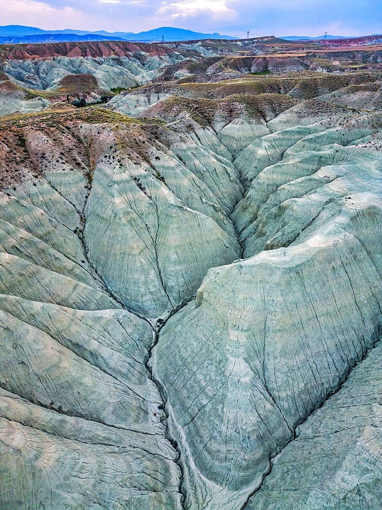 Davutoglu colorful mountains drone aerial view at sunset in Turkey