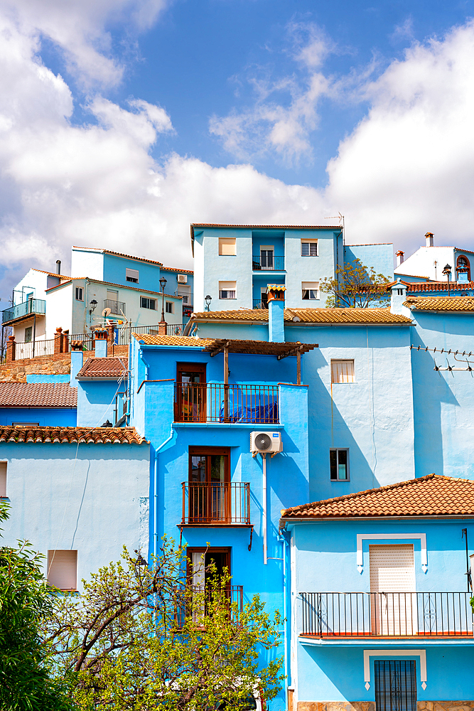 Street in blue painted Smurf house village of Juzcar, Pueblos Blancos region, Andalusia, Spain, Europe