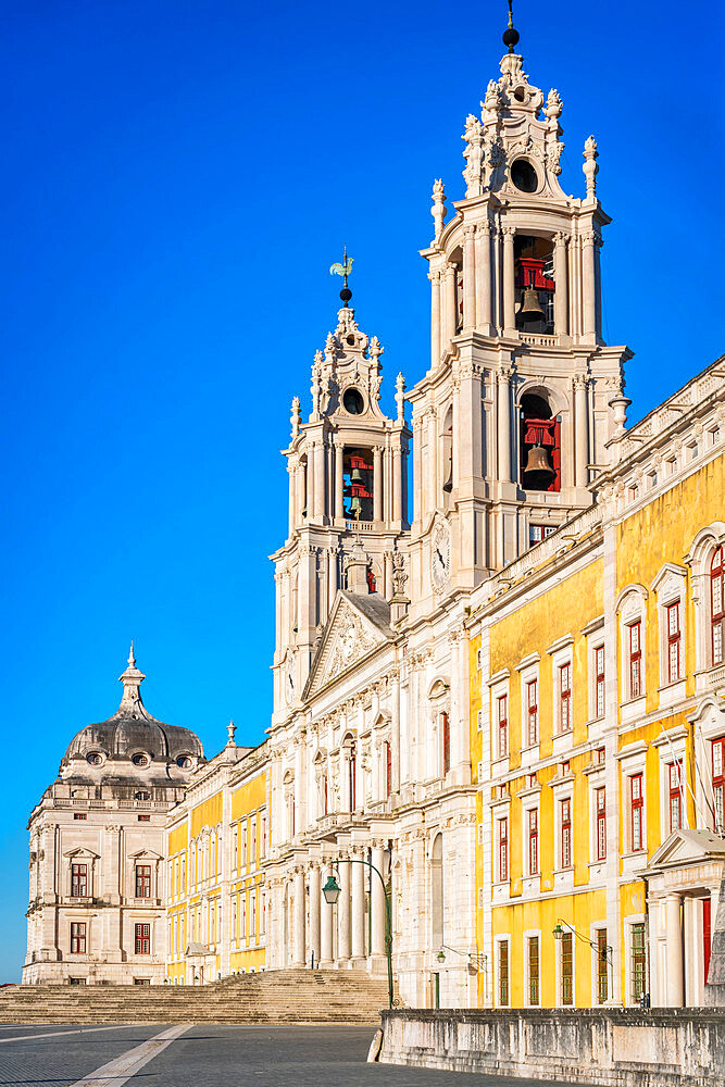 Mafra Palace entrance with iconic towers and bells, Mafra, Portugal, Europe