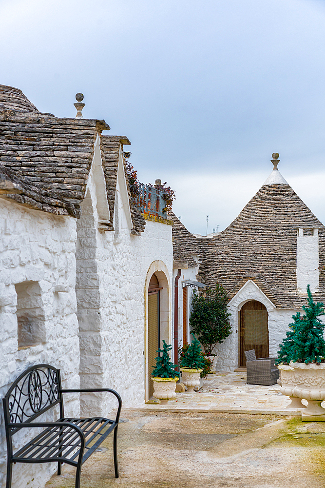 Alberobello iconic old Trullo and Trulli white houses with stone ceilings in conical shape, UNESCO World Heritage Site, Alberobello, Apulia, Italy, Europe